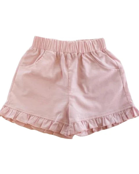 Pink shorts with ruffled hem on a white background