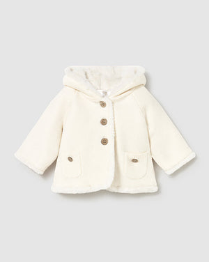 White coat with gold buttons on a light gray background