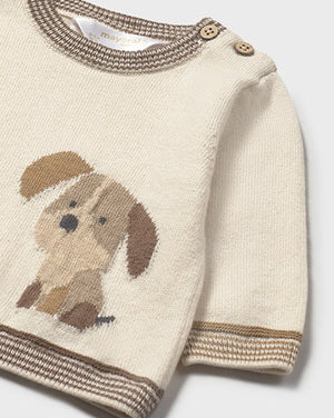 Knitted sweater with a dog design on a white background