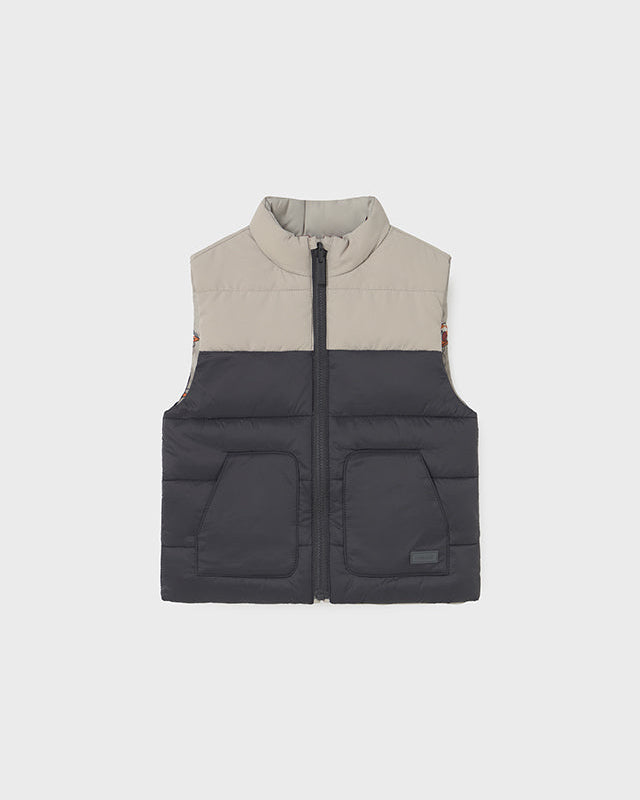 Two-tone vest with gray top and black bottom on a white background