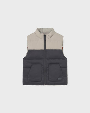 Two-tone vest with gray top and black bottom on a white background