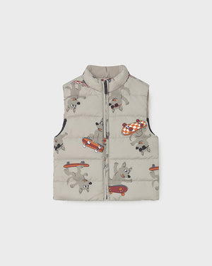 Children's puffer vest with cartoon dog design on a light gray background