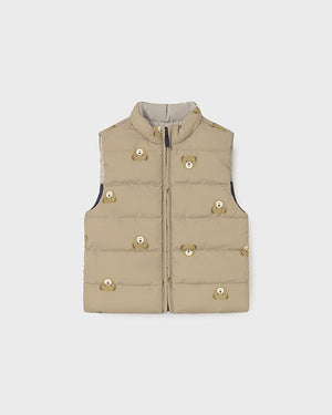 Beige puffer vest on a light gray background