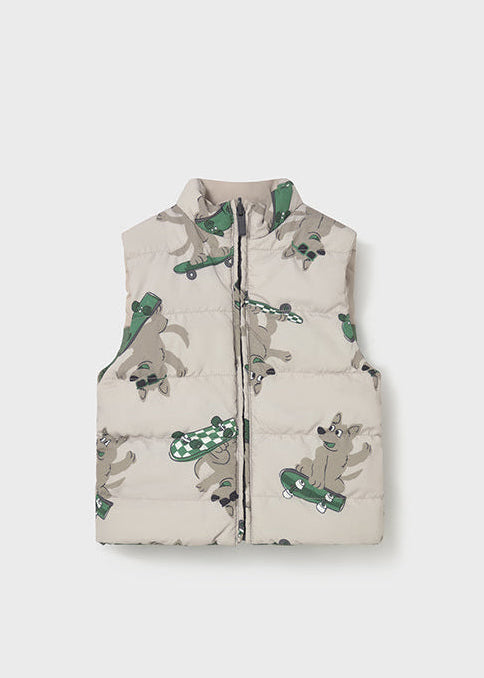 Children's puffer vest with animal print on a white background