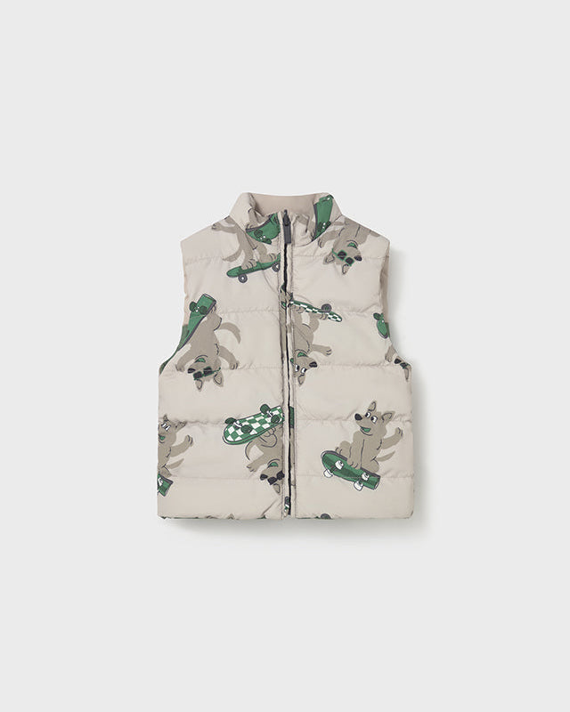 Children's puffer vest with animal print on a white background