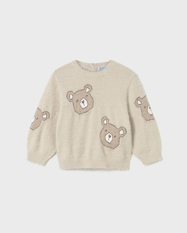 Beige sweater with bear designs on a white background