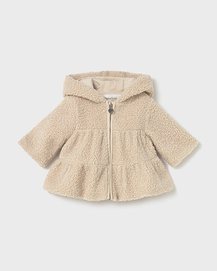 Beige children's jacket with a hood on a white background