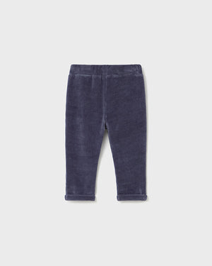 Navy blue pants on a light gray background