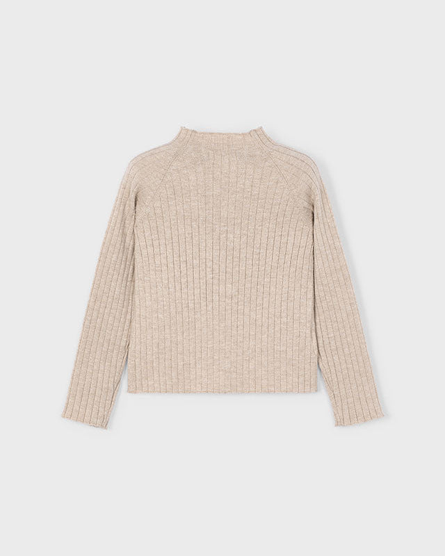 Beige ribbed sweater on a light gray background