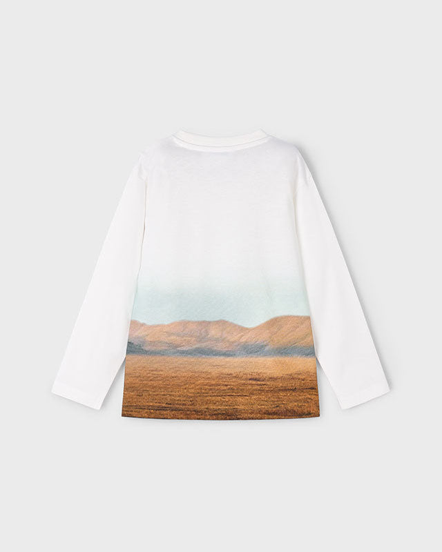 White long-sleeve shirt with a desert landscape print on a white background
