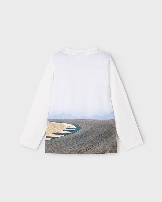 White long-sleeve shirt with a scenic print on a white background