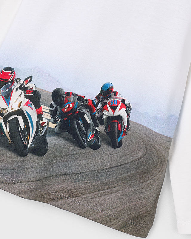 Three motorcyclists on a winding road with a white background