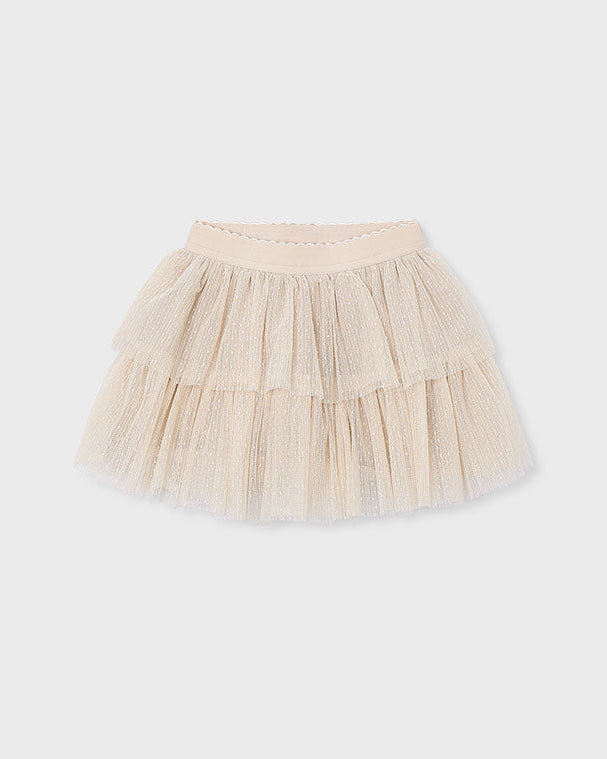 Beige tulle skirt on a white background