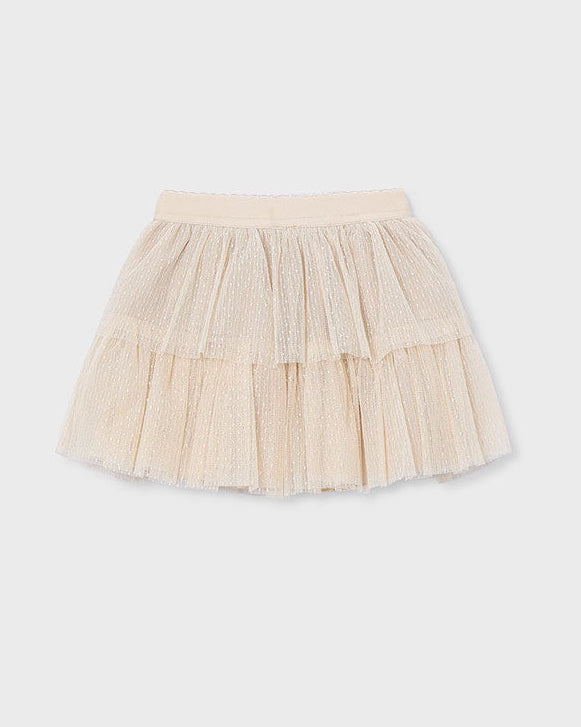Beige tulle skirt on a white background