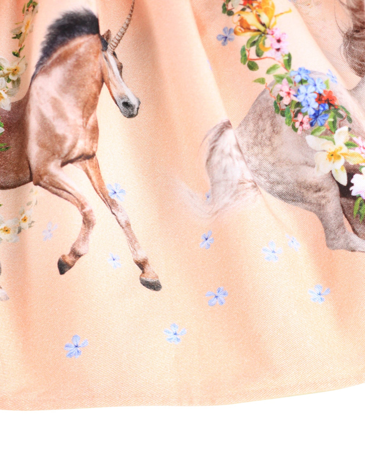 Horses with floral decorations on a light background