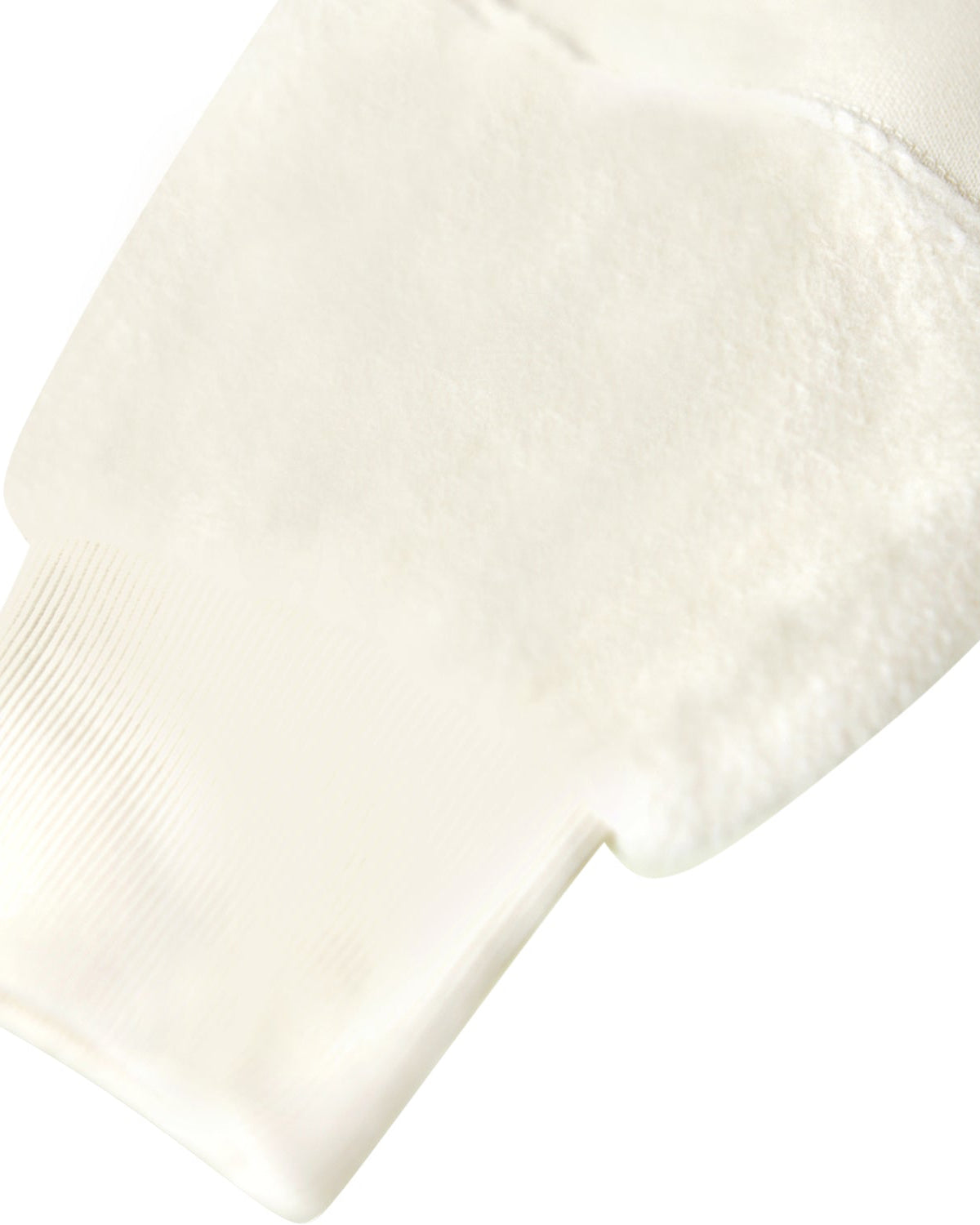 Close-up of a white sock on a white background