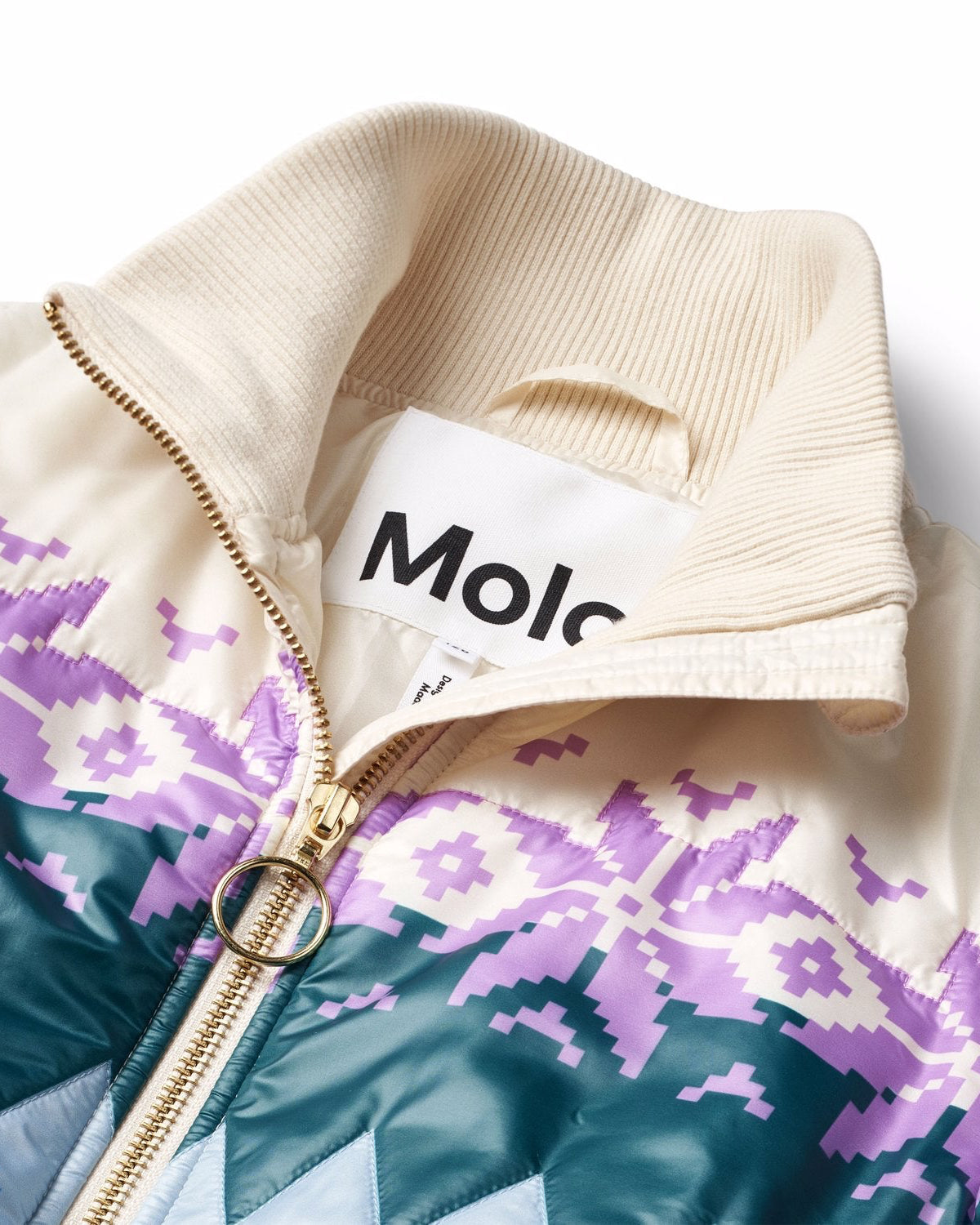 Close-up of a jacket with a visible brand logo on a white background