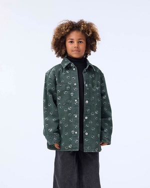 Child wearing a green floral-patterned jacket on a white background