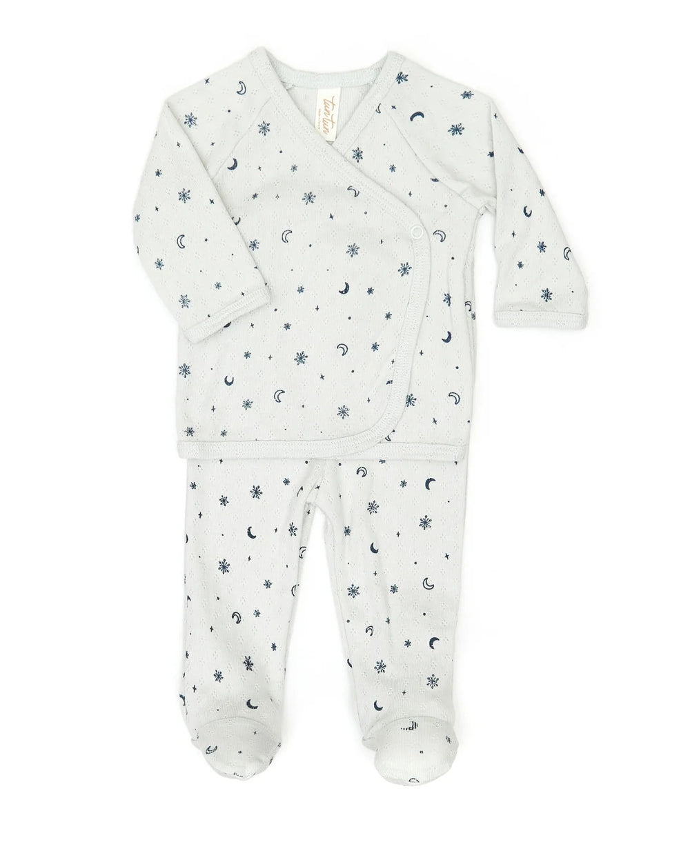 Baby onesie with star and moon pattern on a white background