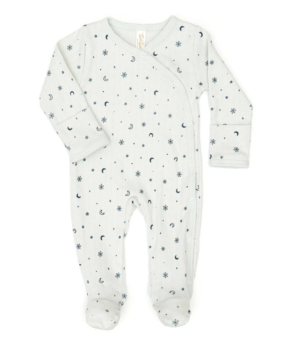Baby onesie with star and moon pattern on a white background