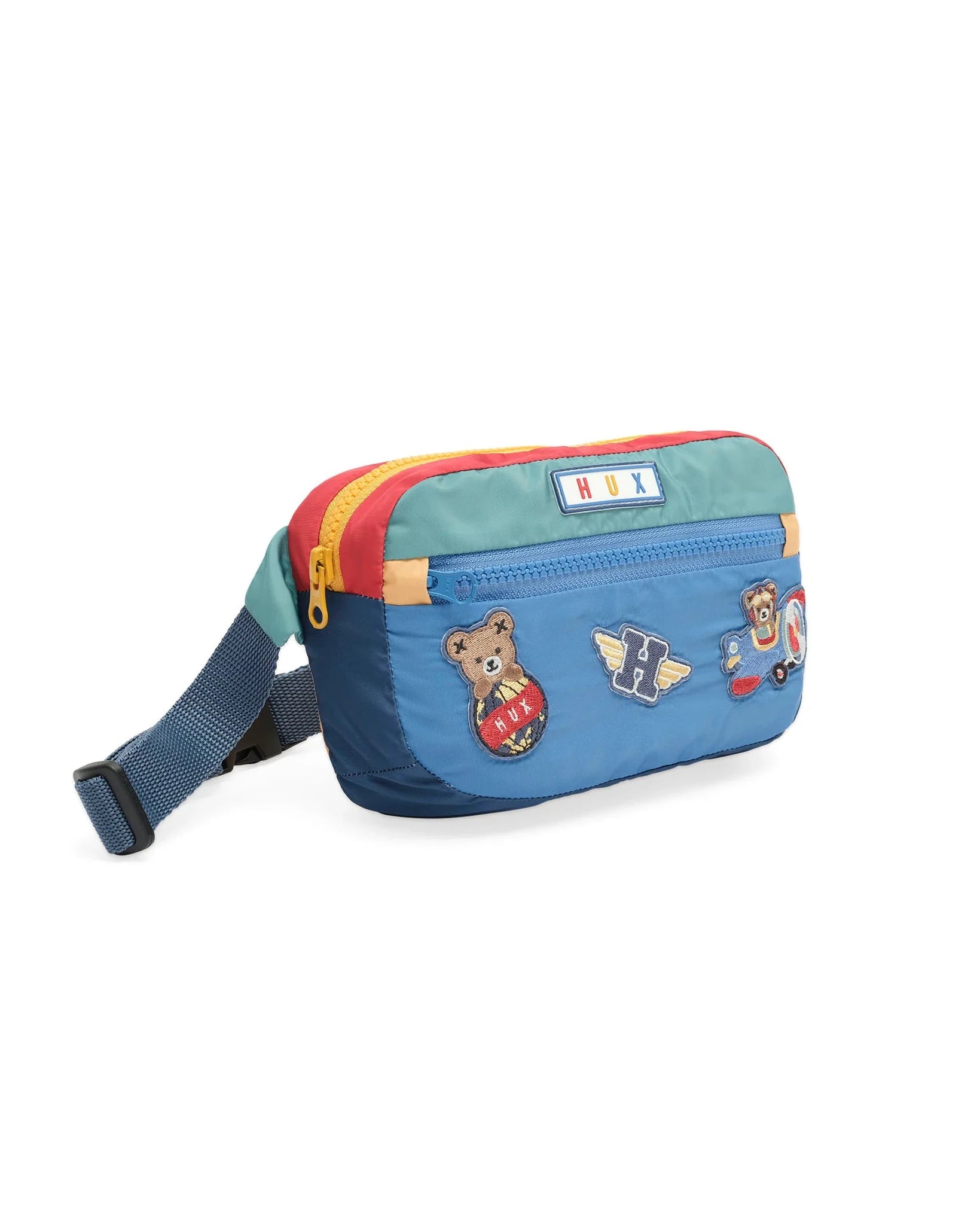 Blue waist bag with colorful accents and patches on a white background