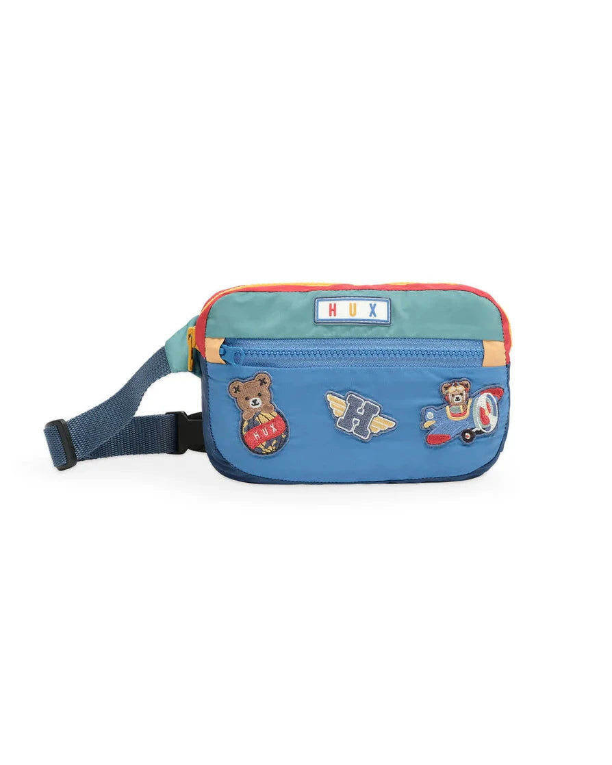 Blue waist bag with character patches on a white background