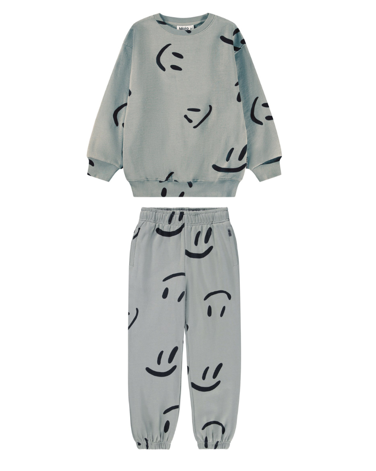 Light gray sweatshirt and pants set with smiley face patterns on a white background