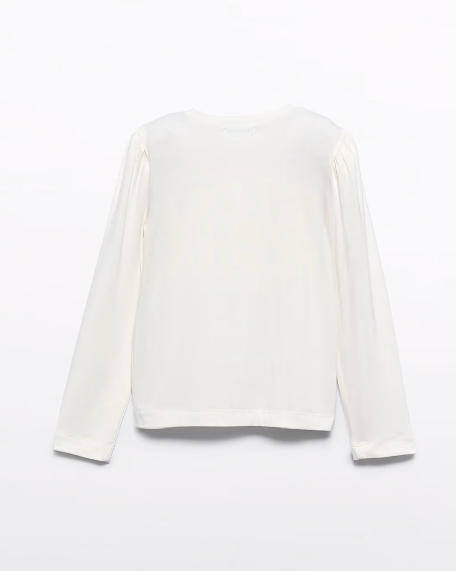 White long-sleeve top on a light gray background
