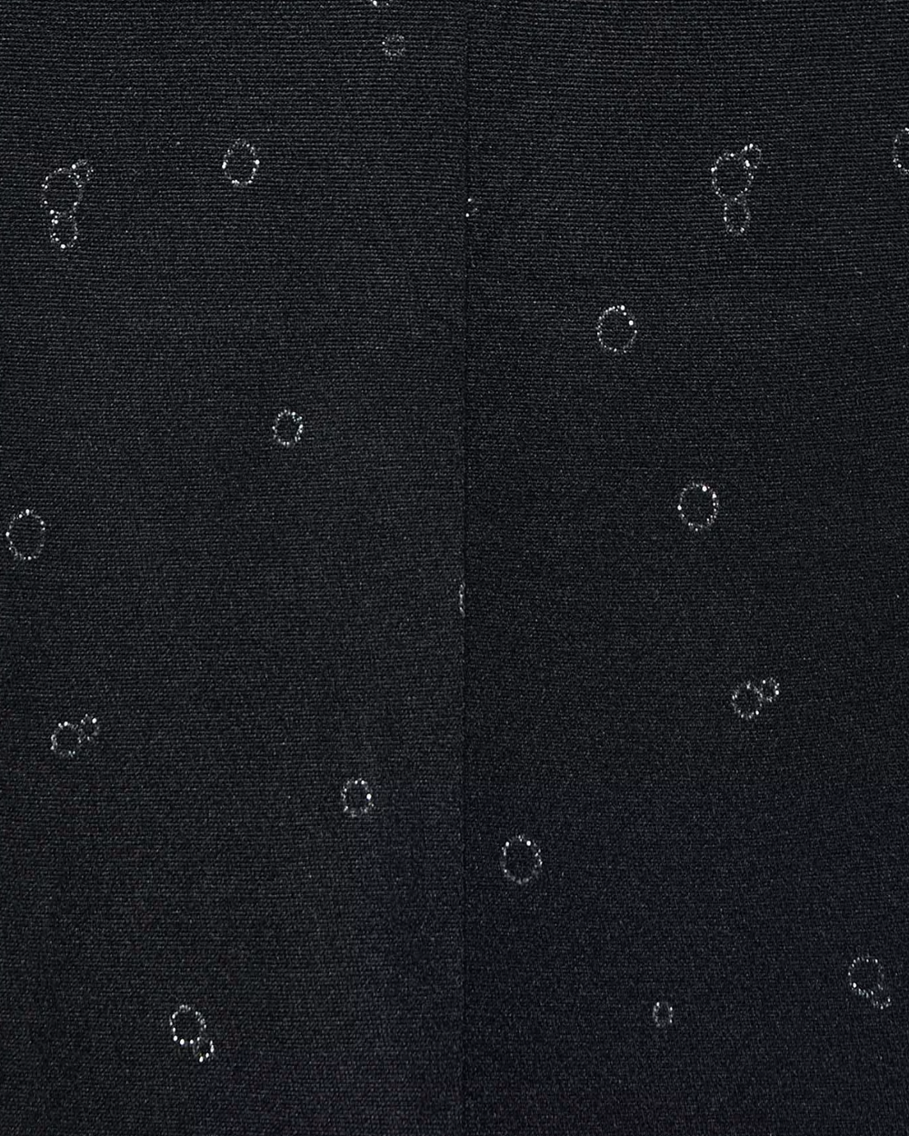 Black fabric with small white circular patterns