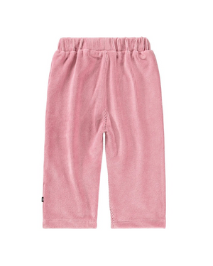 Pink corduroy pants on a white background