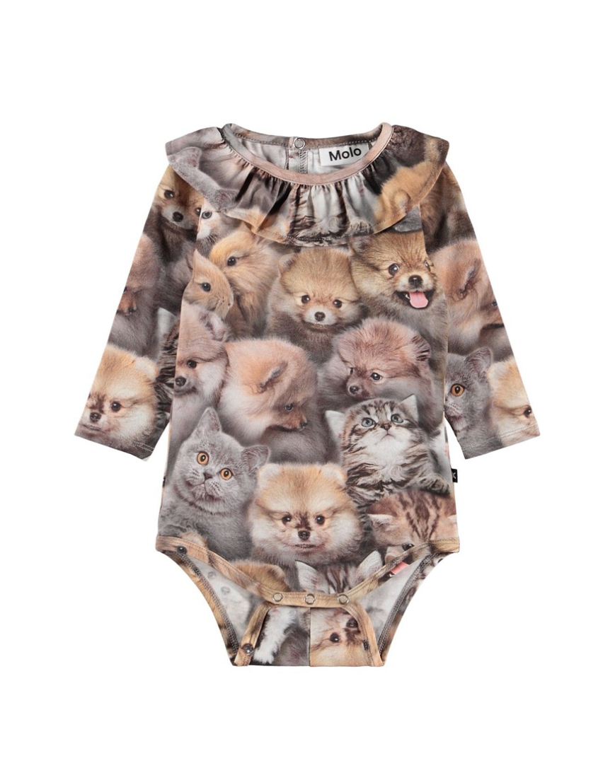 Baby onesie with animal print on a white background