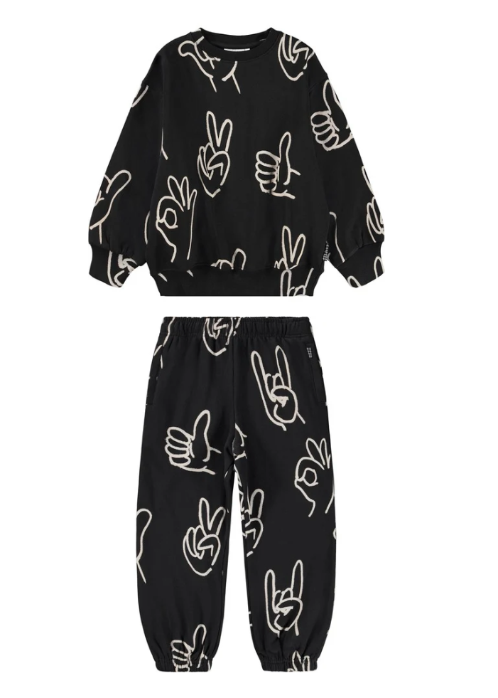 Black outfit with white hand gesture patterns on a white background