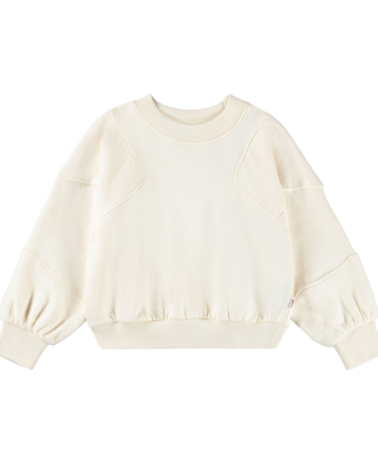Cream-colored sweater with balloon sleeves on a white background
