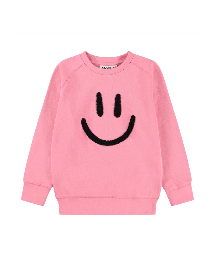 Pink sweatshirt with a black smiley face design on a white background