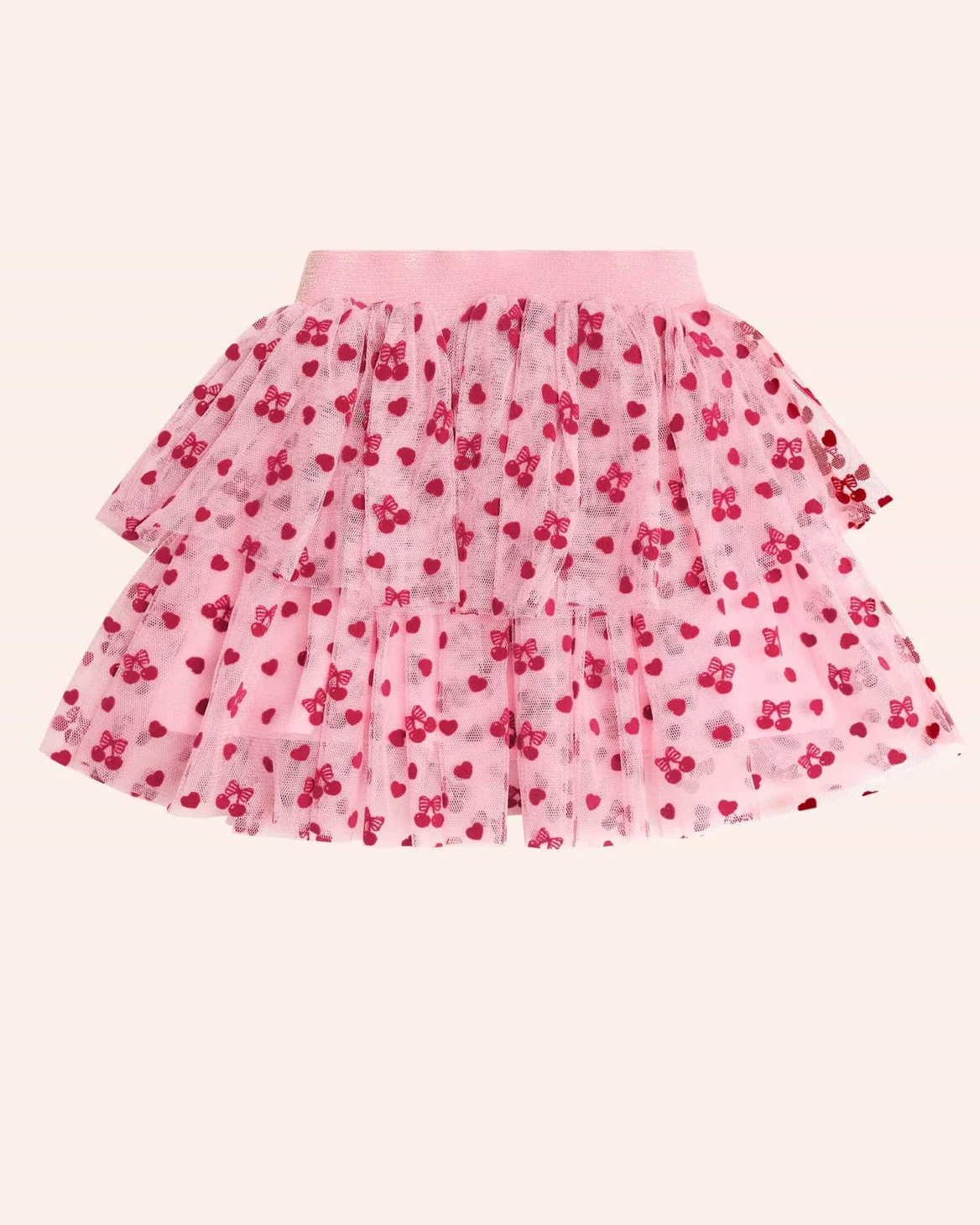 Pink skirt with red floral pattern on a white background