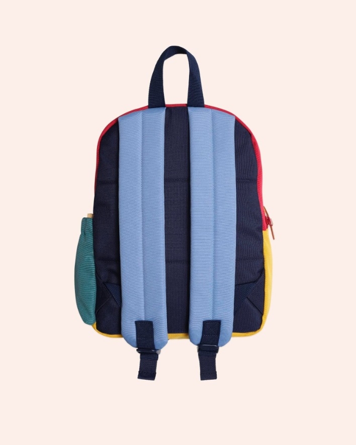 Backpack with blue and black straps on a beige background