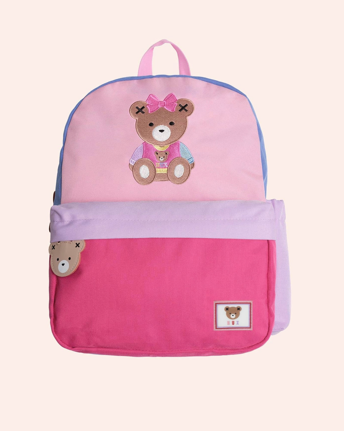 Pink backpack with teddy bear design on a white background