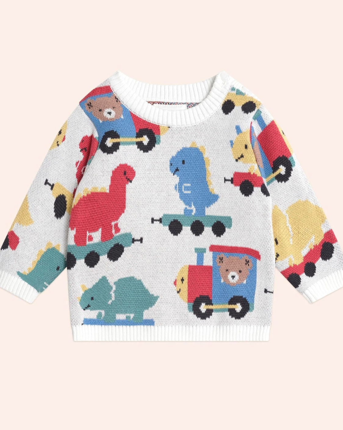 Children's sweater with animal and vehicle pattern on a light pink background