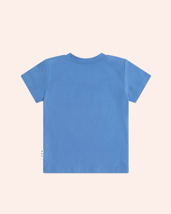 Blue t-shirt on a beige background