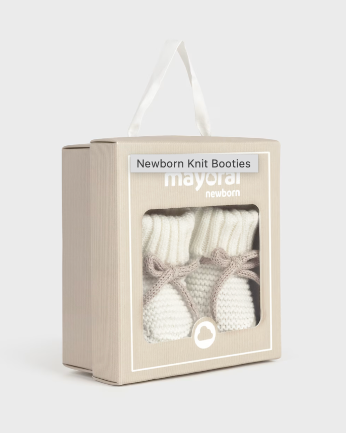 Newborn knit booties in a Mayoral packaging box on a white background