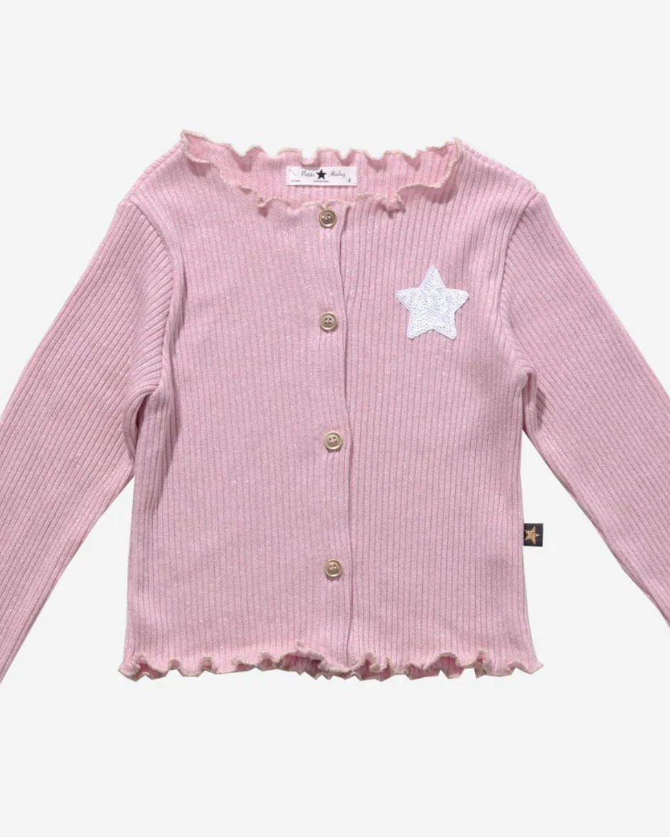 Pink ribbed cardigan with star design on a white background