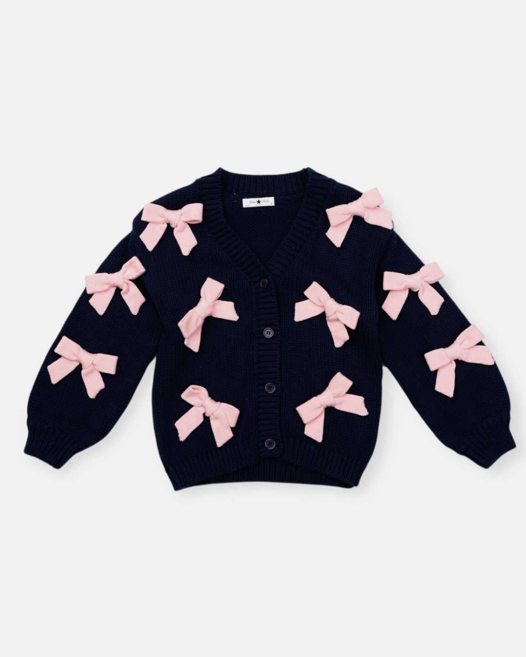 Navy blue cardigan with pink bows on a white background