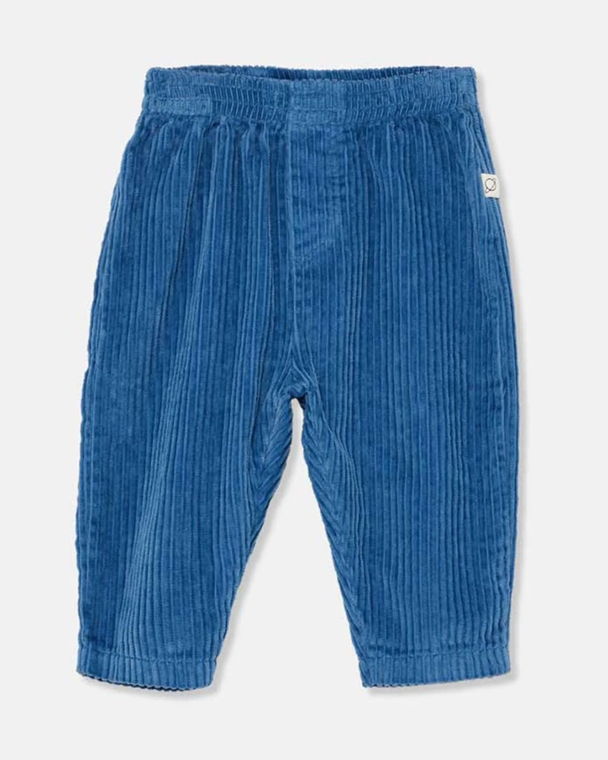Blue corduroy baby pants on a light gray background