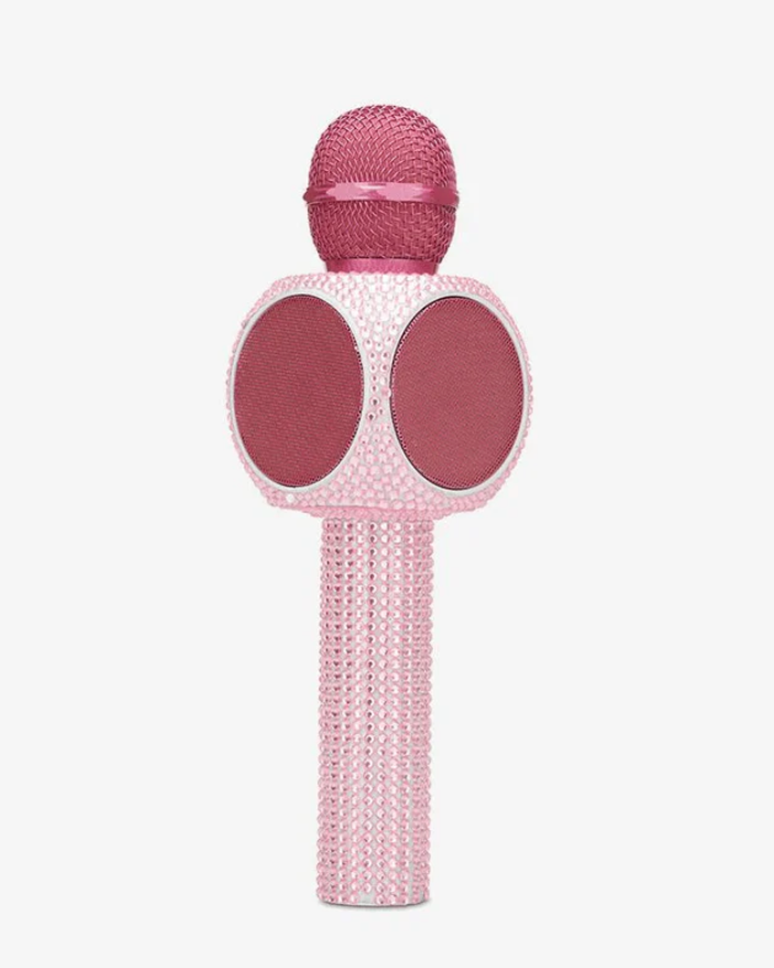 Pink microphone with bling on a white background