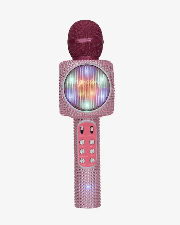 Pink microphone with LED display on a white background