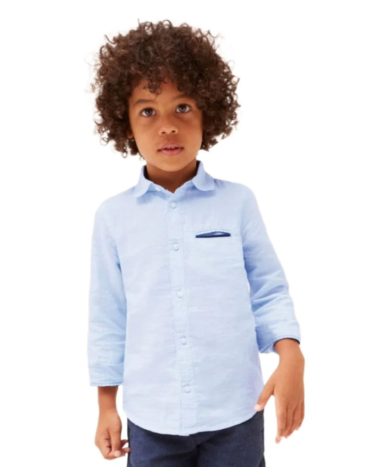 Child wearing a light blue checkered shirt on a white background