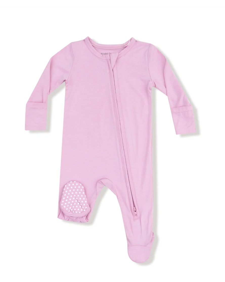 Pink baby onesie with a zipper on a white background