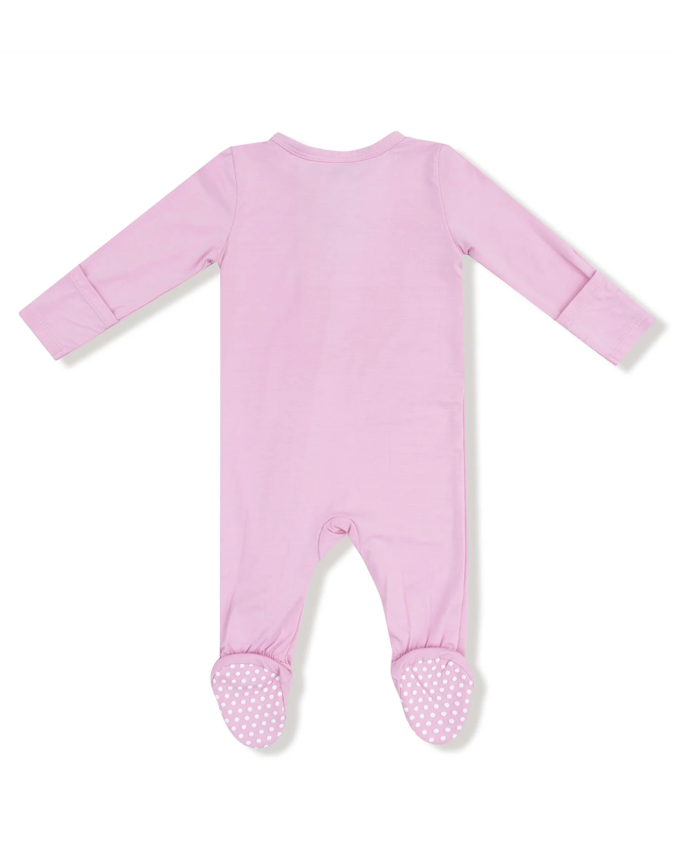 Pink baby onesie with footies on a white background