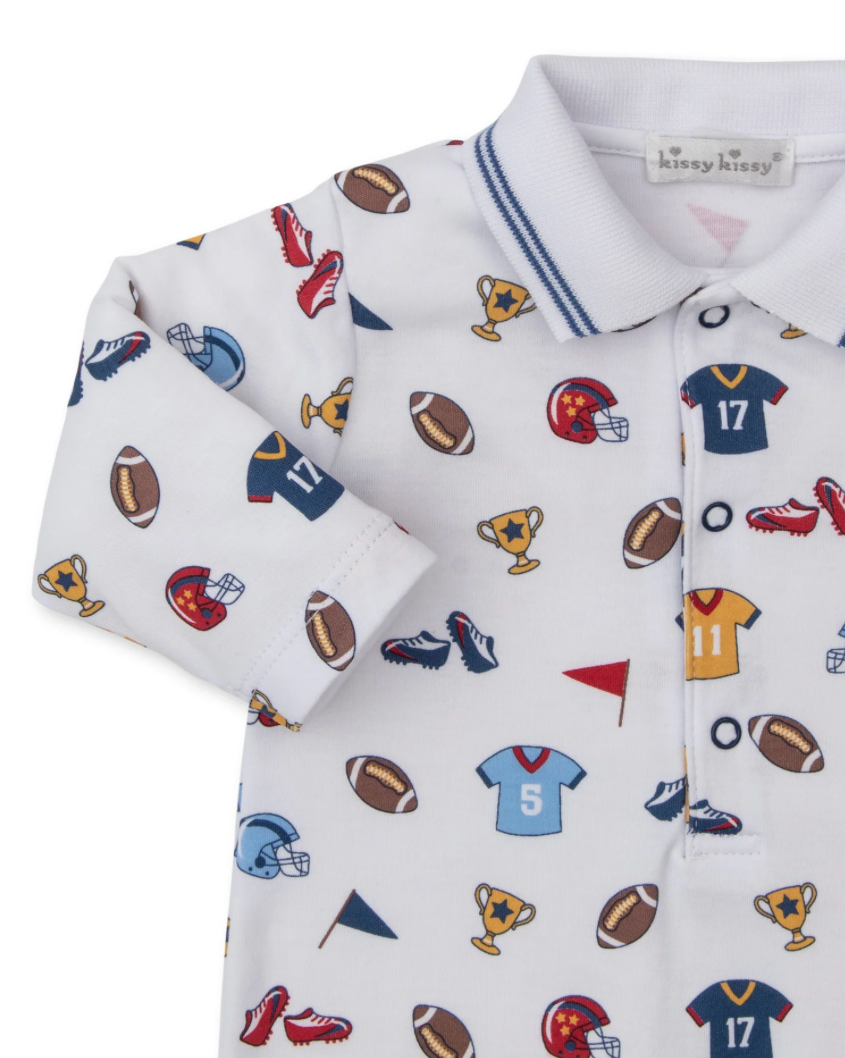 Children's long-sleeve shirt with sports-themed pattern on a white background