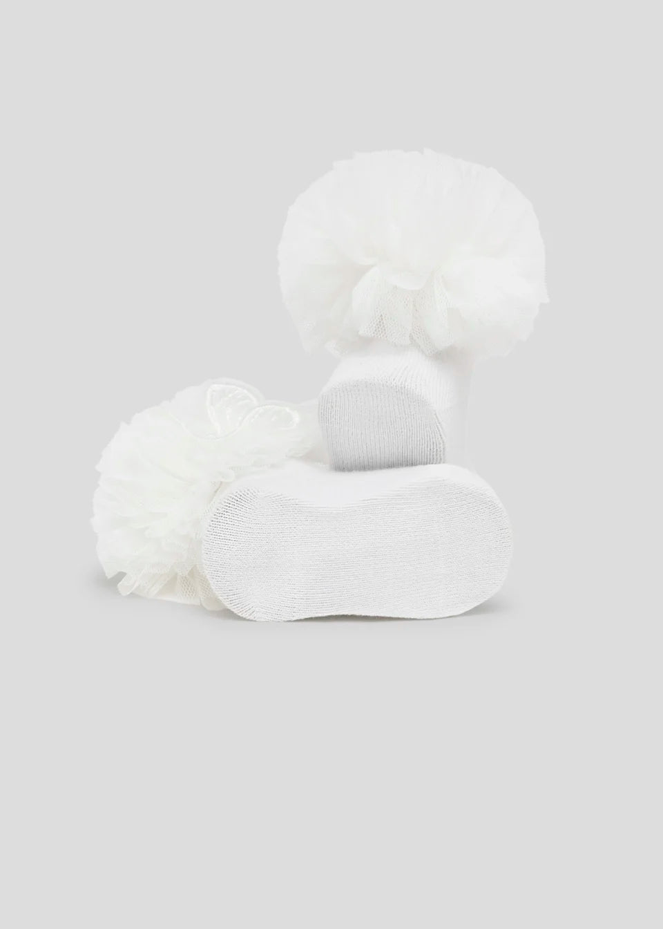 Organic cotton white bow socks and headband for baby girl.
